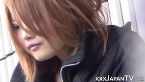 Babe from Japan plays with her pussy on the streets