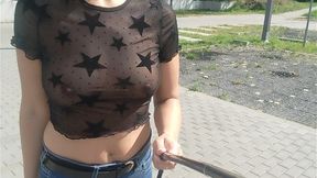 Exposed breasts flash in crowded street