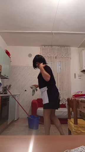 Transvestite does house cleaning