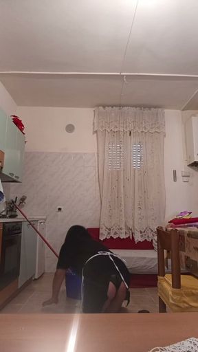 Transvestite does house cleaning