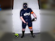 Rubber Cyclist Pup enjoying his gear (sniffing & pawing off)