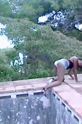 Shania Shania Strip Near an Old Abandoned Swimming Pool