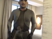 showing dolphin wetsuit bulge and silicone mask at hotel door and window, no cum