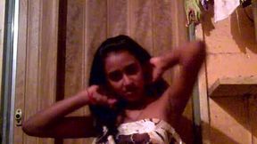 Long haired young Desi chick tenderly plays with her small titties