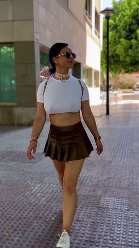 Slim braless girl shows off big tits while walking in public
