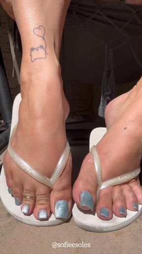 Blue cat eye toes shimmering in the sun