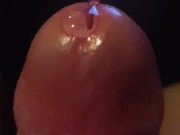 Teasing big uncut dick glans with precum play