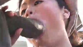 Lean Asian babe with nice ass deepthroats big black cock