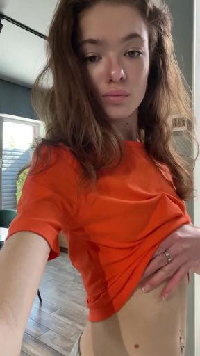 Female Onlyfans Model in Orange Shirt
