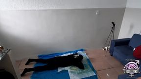 behind the scenes with a group of shemales trampling and cumming on a masked dude