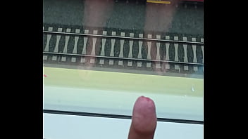 horny wank at the hotel window at the train station
