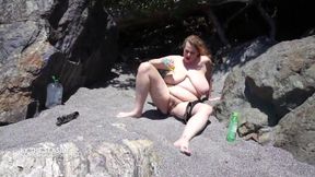 Busty BBW fucks herself at the seaside