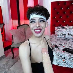 Beautiful femboy plays with a condom and his mouth