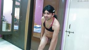 Hot sissy crossdresser femboy Sweet Lollipop in a hot red and black lingerie.