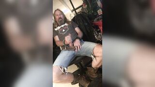 Longhairdude shoots onto RedWing shoes in jeans cut-offs and Anarchy tshirt