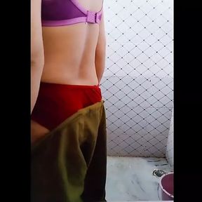 Hot Bhabhi bathing in panties, showing her ass