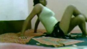 Nasty brunette is teasing herself n the bed