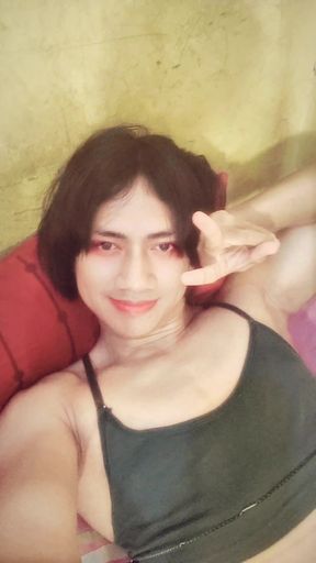 Playful femboy on camera