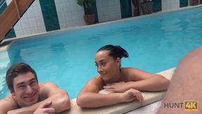 Amateur Slim brunette has sex with stranger by the pool near her man