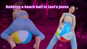 Rubbing a beach ball in levis jeans