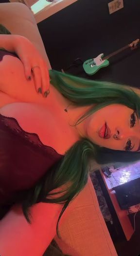 Green hair, black bra