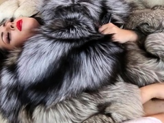 Mistress Rebecca playing in furs