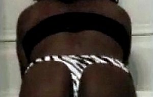 Crossdresser ebony shows her body