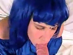 Blue wig crossdresser blowing