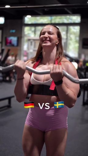 Hunky gym babe shows off her muscles and workout routine