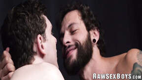 Muscular tattooed hunk Eddie Danger asserts his dominance over twink Ethan Tate