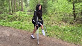 Crutches walking, broken leg, leg cast, walking in one shoe