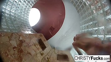 Tattooed brunette with a nice, round ass, Christy Mack is having a shower and touching herself