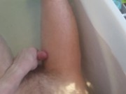 Teen in the bath showing off his skinny legs and cock