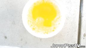 Kinky chick from Japan keeps track of how much she can pee
