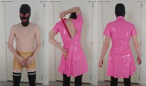 Pink latex maid dress over see-through stockings and rubber pants