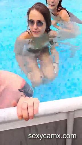 Two sluts suck cocks and get pounded outdoor by the pool