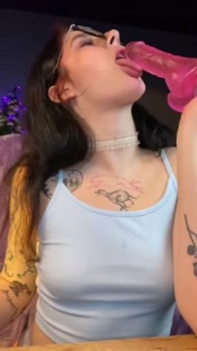Hot babe swallows a big pink cock