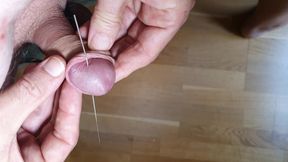 Needle in glans and jerked off