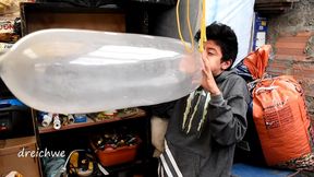 in a cellar inflating condoms