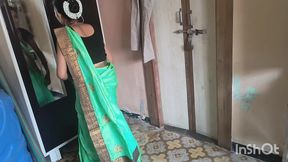 village bhabhi in green saree getting ready for party.