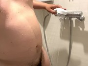 A chubby Asian guy with a fat belly and a small cock takes a shower