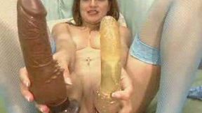 Cheerful brown haired MILF flaunts her mature body and two giant dildos