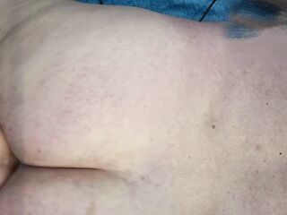 Taking my dildos laying on my belly still in a flat chastity cage