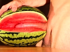 Muscular Stud Fucks and Cums on Watermelon