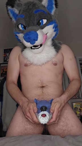 Furry mascot in bed