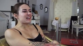 She orders him to loudly inhale the smell of her sweaty, stinky feet and verbally humiliates him.