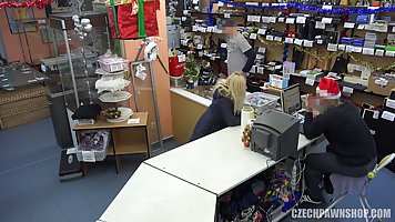 Czech blonde is sucking a rock hard dick in a pawn shop, before getting stuffed with it