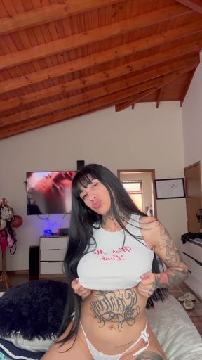 Busty babe showcases her big boobs