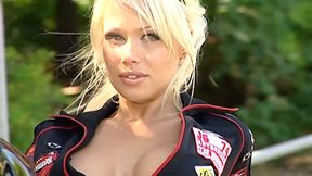 This Beautiful Biker Shows You the Curves of Her Body and Those of Her Motorbike