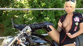 This Beautiful Biker Shows You the Curves of Her Body and Those of Her Motorbike